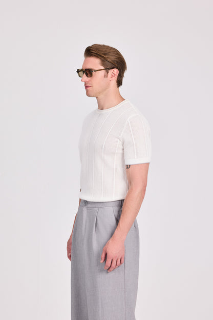 بلوزة محبوكة باللون الأزرق البحري برقبة دائرية