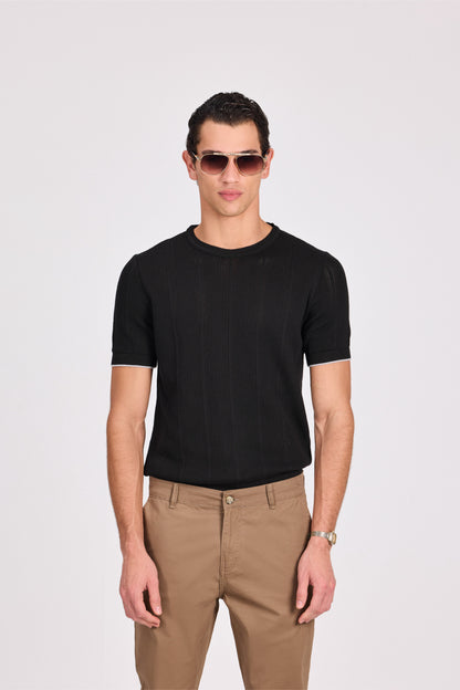 بلوزة محبوكة باللون الأزرق البحري برقبة دائرية