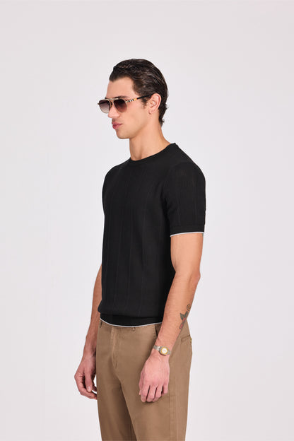 بلوزة محبوكة باللون الأزرق البحري برقبة دائرية